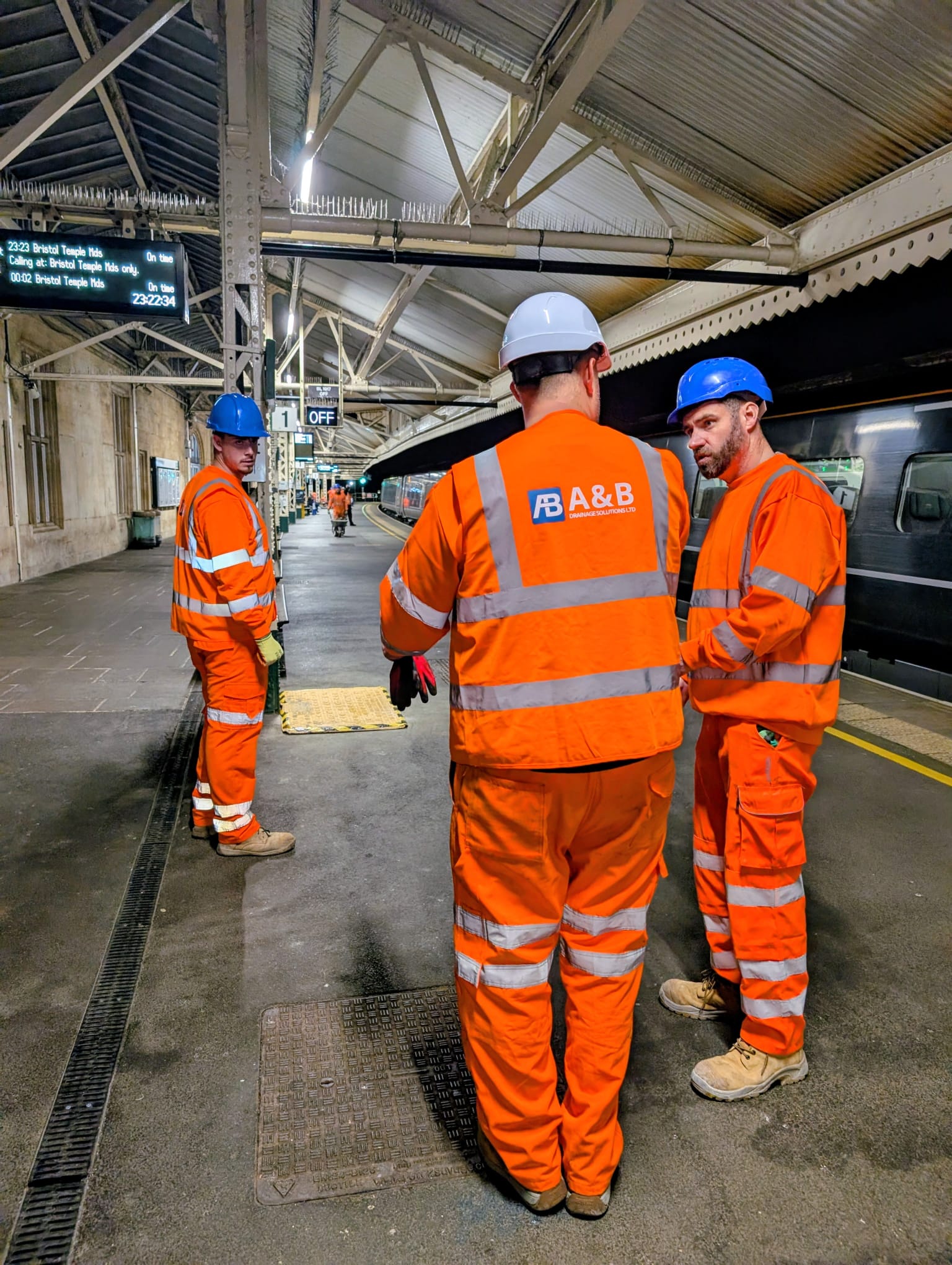 A&B Drainage engineers on a railway platform